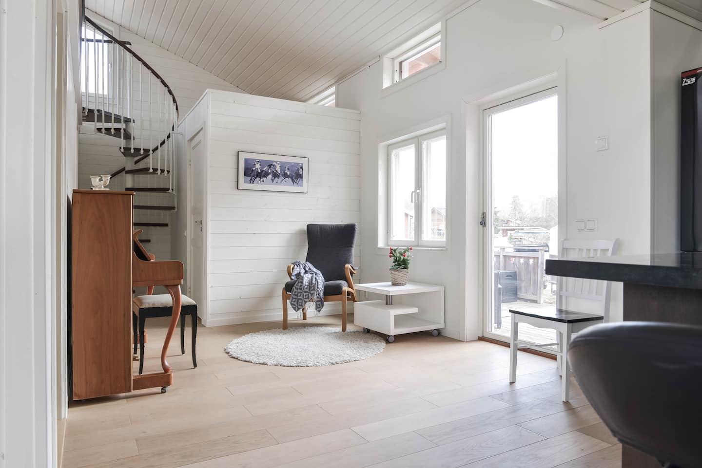 A quiet corner for reading or work by the terrace door