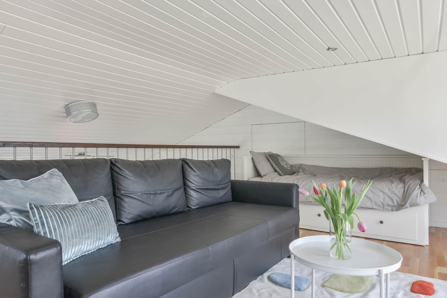 Sofa bed and bed in the loft