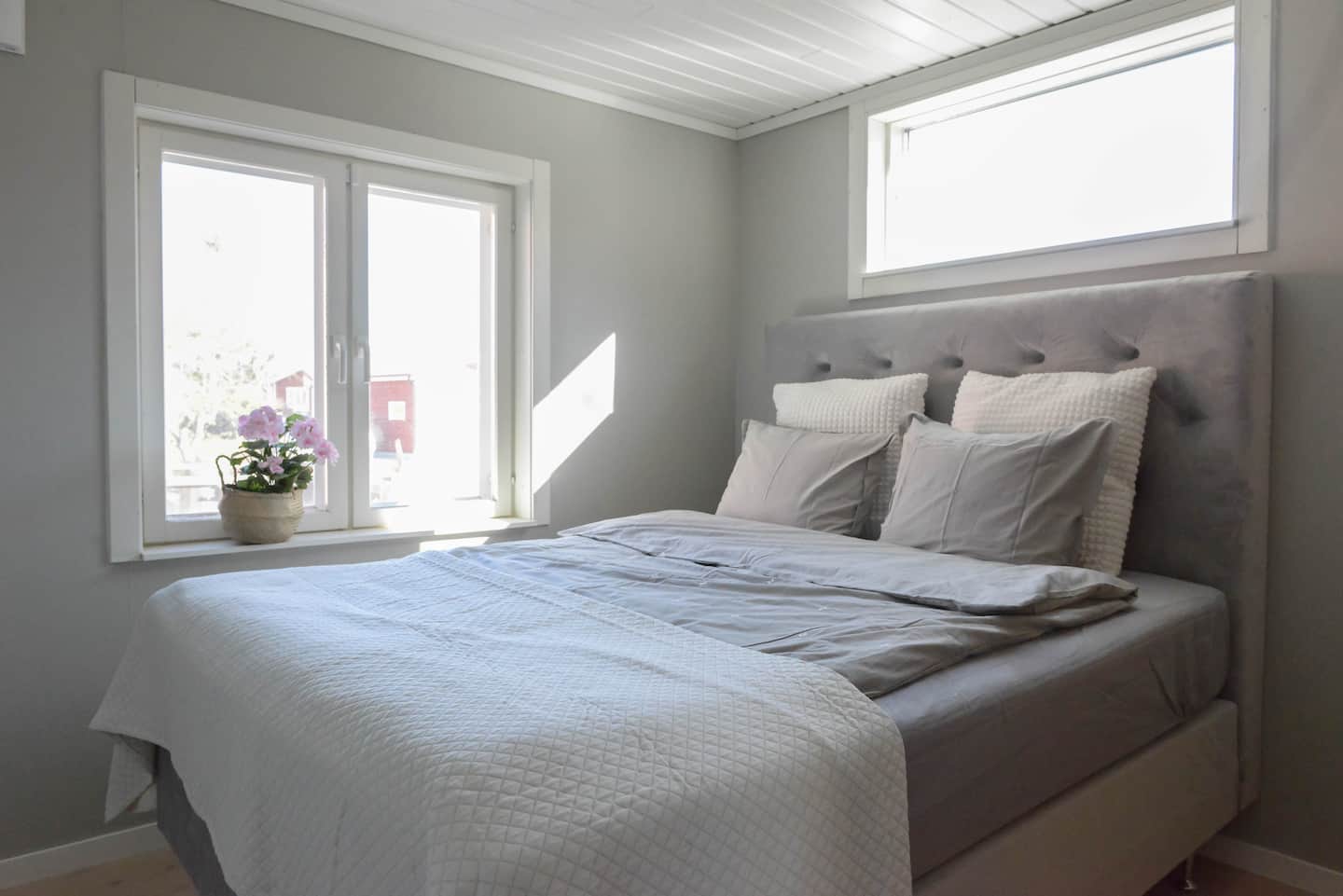 Bedroom with soft linen and morning light