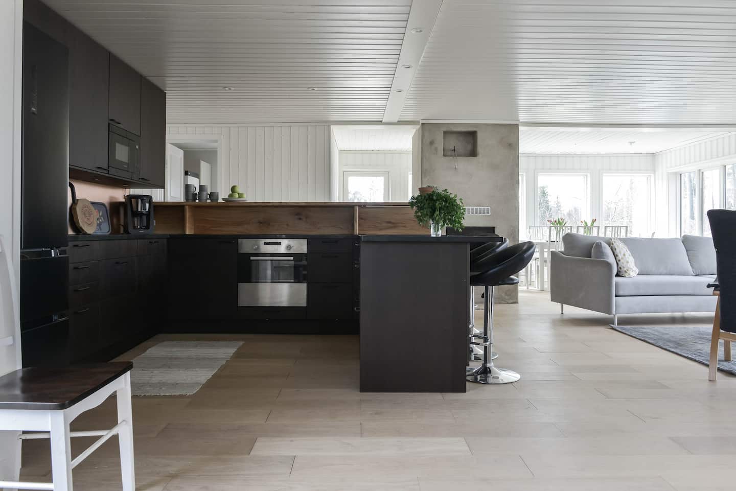 Spacious kitchen with black granite worktops and solid oak